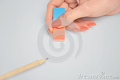 Woman hand erasing Stock Photo