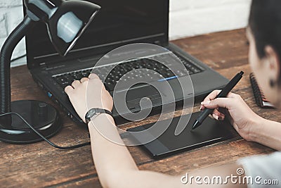 Woman hand graphic tablet Stock Photo