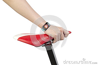 Woman hand holding bike seat wearing health sensor smart watch Stock Photo