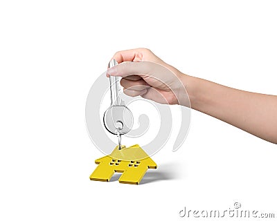 Woman hand holding key with house shape keyring Stock Photo