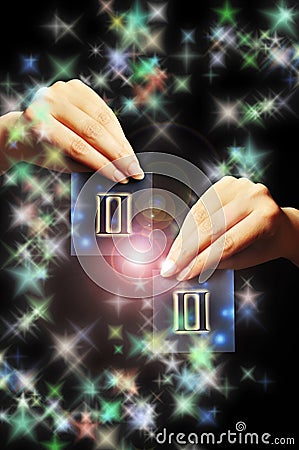 Woman hand keeping a blue card with zodiac symbol of Gemini like astrology concept Stock Photo