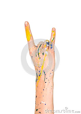 Woman hand in paint making sign of the horns (rockers) Stock Photo