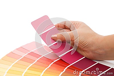 Woman hand pointing to a sample color chart Stock Photo