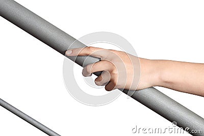 Woman hand resting on a railing Stock Photo