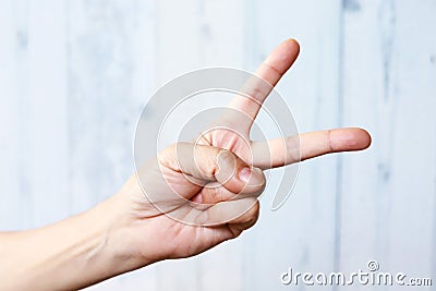 Woman hand scissors gesture, peace gesture Stock Photo
