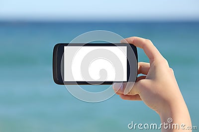 Woman hand showing a blank smart phone horizontal screen display Stock Photo