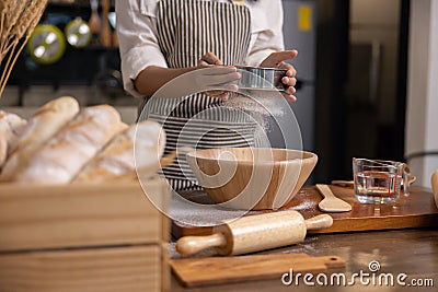 Woman Hand Sifting Bread Flour Stock Photo