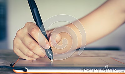 Woman hand using mouse pen Stock Photo