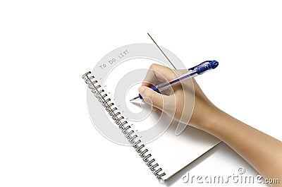 Woman hand writing with pen on notebook Stock Photo