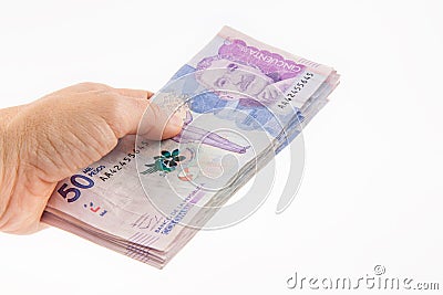 Woman handling money Stock Photo