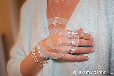 Woman hands with boho gypsy accessories rings and bracelets closeup Stock Photo