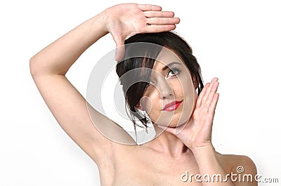 Woman hands framing face Stock Photo