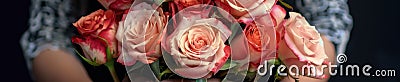 woman hands gently holding a lavish bouquet of roses Stock Photo