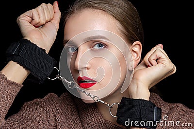 Woman hands are handcuffed Stock Photo