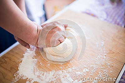 Woman hands kneading pasta dough bread Stock Photo