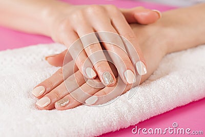 Elegant Perfection: Cream Nails Manicure on Teen Female Hands Stock Photo