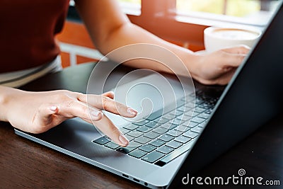Woman hands office worker typing on the Enter keyboard Stock Photo