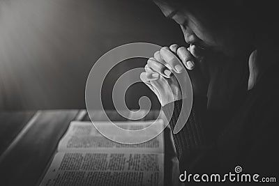 Woman hands praying to god with the bible. Woman Pray for god blessing. Religious beliefs Christian life crisis prayer to god Stock Photo