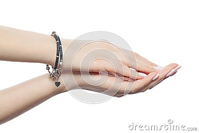 Woman hands wearing silver jewelry bracelet Stock Photo