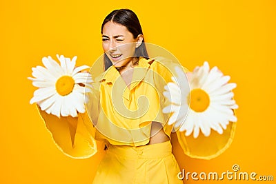 woman happiness smile model yellow flower trend pretty chamomile young portrait Stock Photo