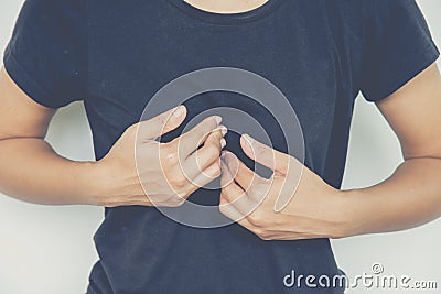 Woman has colic in chest Stock Photo