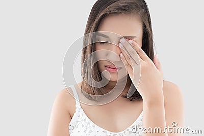 Woman has a pain in the eye Stock Photo