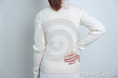 Woman having back pain. Urinary system and Stones, Cancer, world kidney day, Chronic kidney stomach, liver pain and pancreas Stock Photo