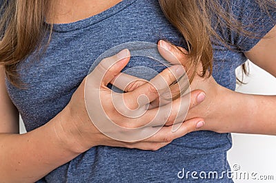 Woman having chest pain, heart attack Stock Photo