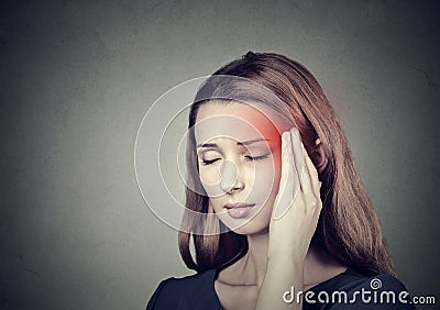 Woman having headache, migraine Stock Photo