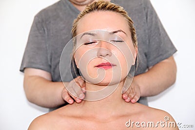 Woman having her neck massaged Stock Photo