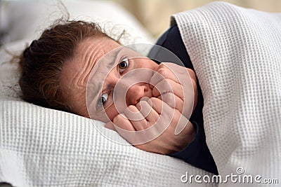 Woman having nightmares Stock Photo