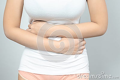 Woman having painful stomachache.Chronic gastritis. .Women are menstrual period, causing abdominal pain Stock Photo