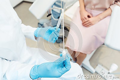 Woman having test for sexually transmitted disease with doctor Stock Photo