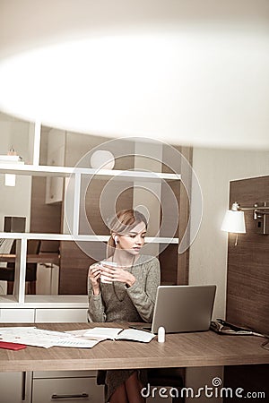 Woman having video chat with husband while on business trip Stock Photo