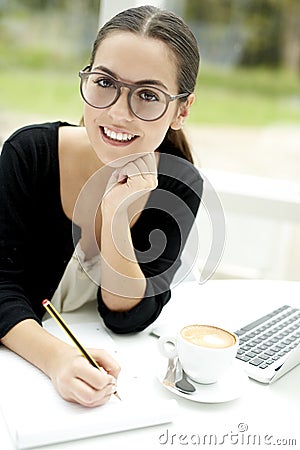 Woman with head tilted up smiling Stock Photo