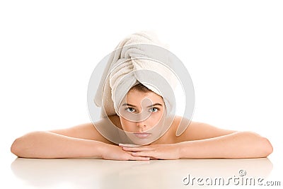 Woman with hair wrapped in towel Stock Photo