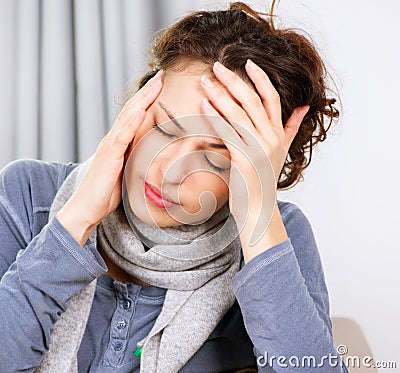 Woman with Headache Stock Photo