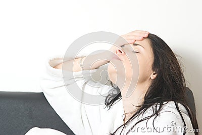 Woman with headache Stock Photo