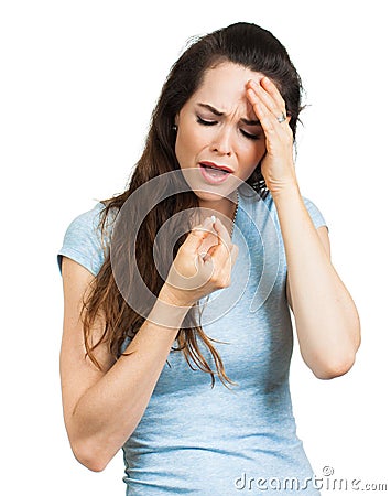 Woman with headache taking pill Stock Photo