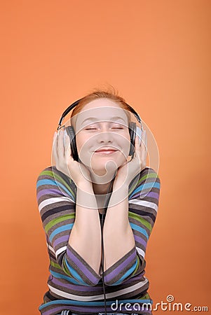 Woman in headphones close-up Stock Photo