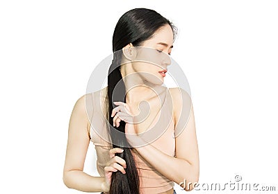 Woman healthy long hair holding her hair Stock Photo