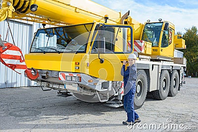 Woman with heavy equipment Stock Photo