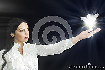 Woman with her angel Stock Photo