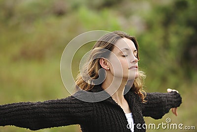 Woman with her arms wide open Stock Photo