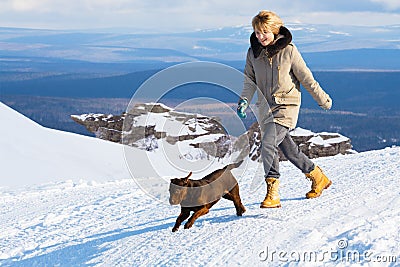 Woman with her dog Stock Photo