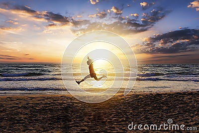 Woman during her outdoor exercise on the beach Stock Photo