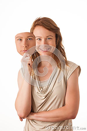 Woman hiding under the happy mask. Stock Photo