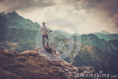 Woman hiker on a mountain Stock Photo