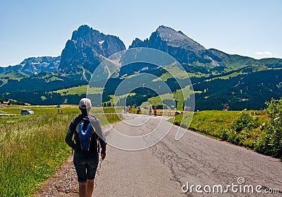 Woman hiking in Italian Alps Stock Photo