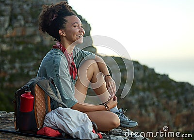 Woman, hiking and mountain top for happiness and wellness and adventure in south africa. Female hiker, smile and cliff Stock Photo
